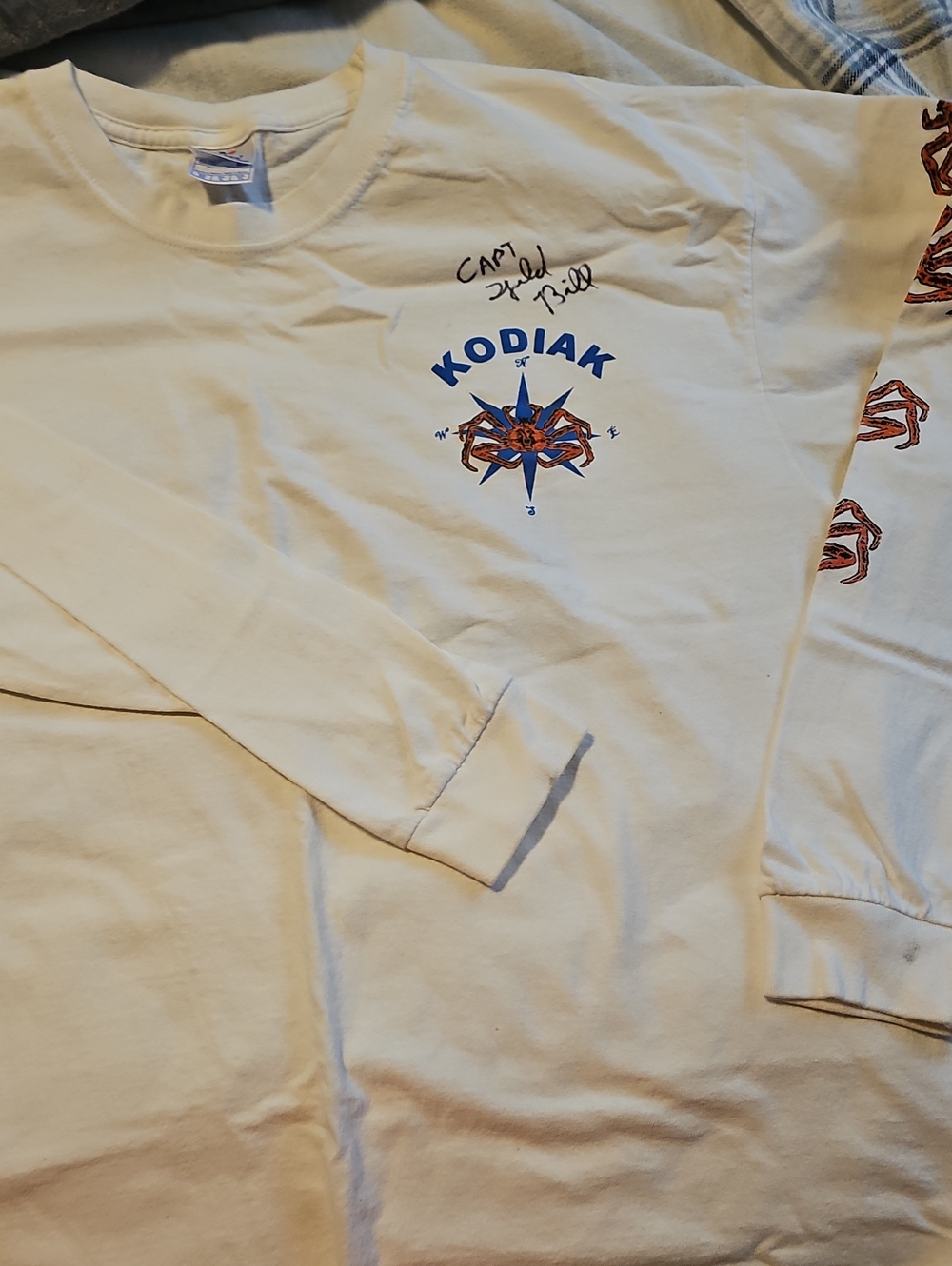 Kodiak White Long-Sleeve Tee with Blue and Orange Compass Crab Graphic